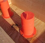 Steel Supply Co. demonstrates a rail post hole sleeve.